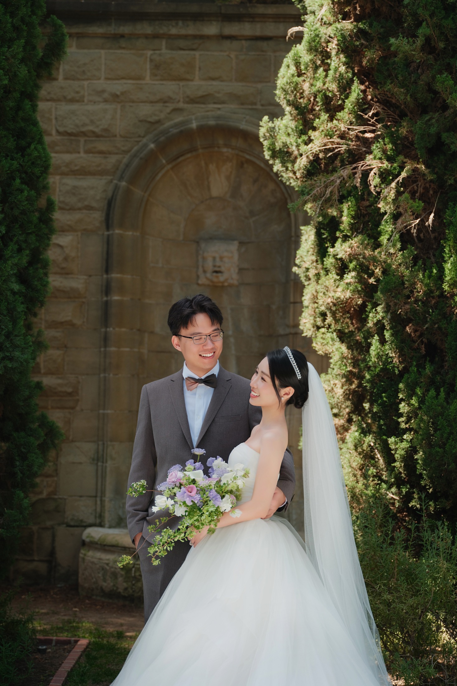 Xinxu and Weiyi posing beside Greystone greenery