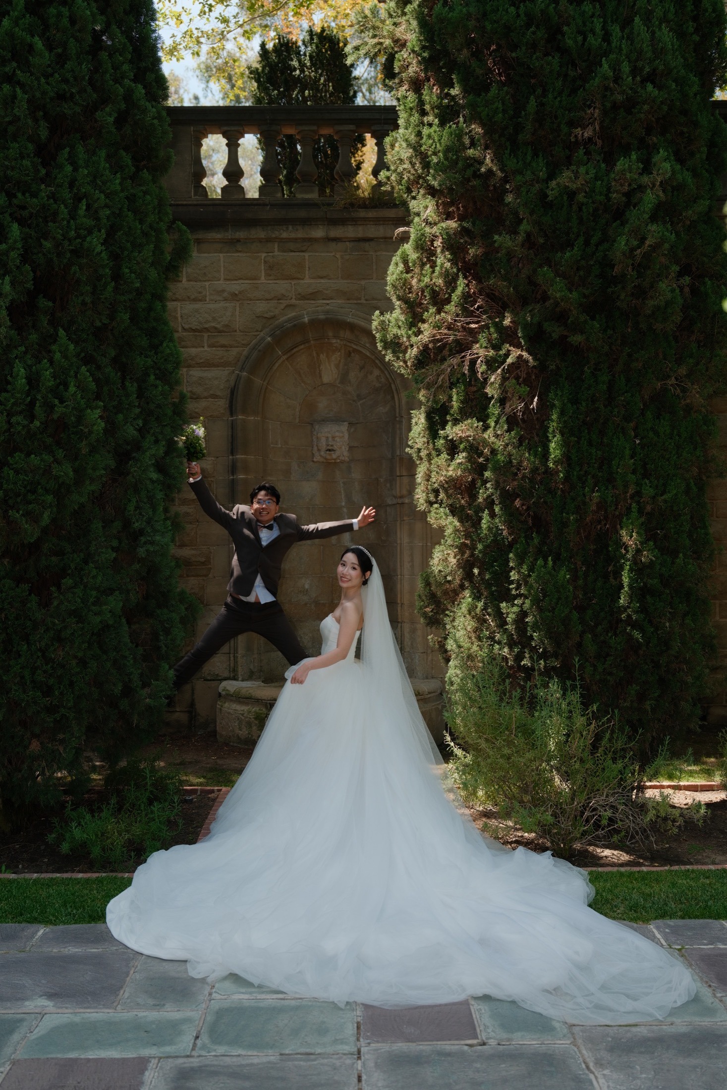 Xinxu and Weiyi standing together by Greystone greenery