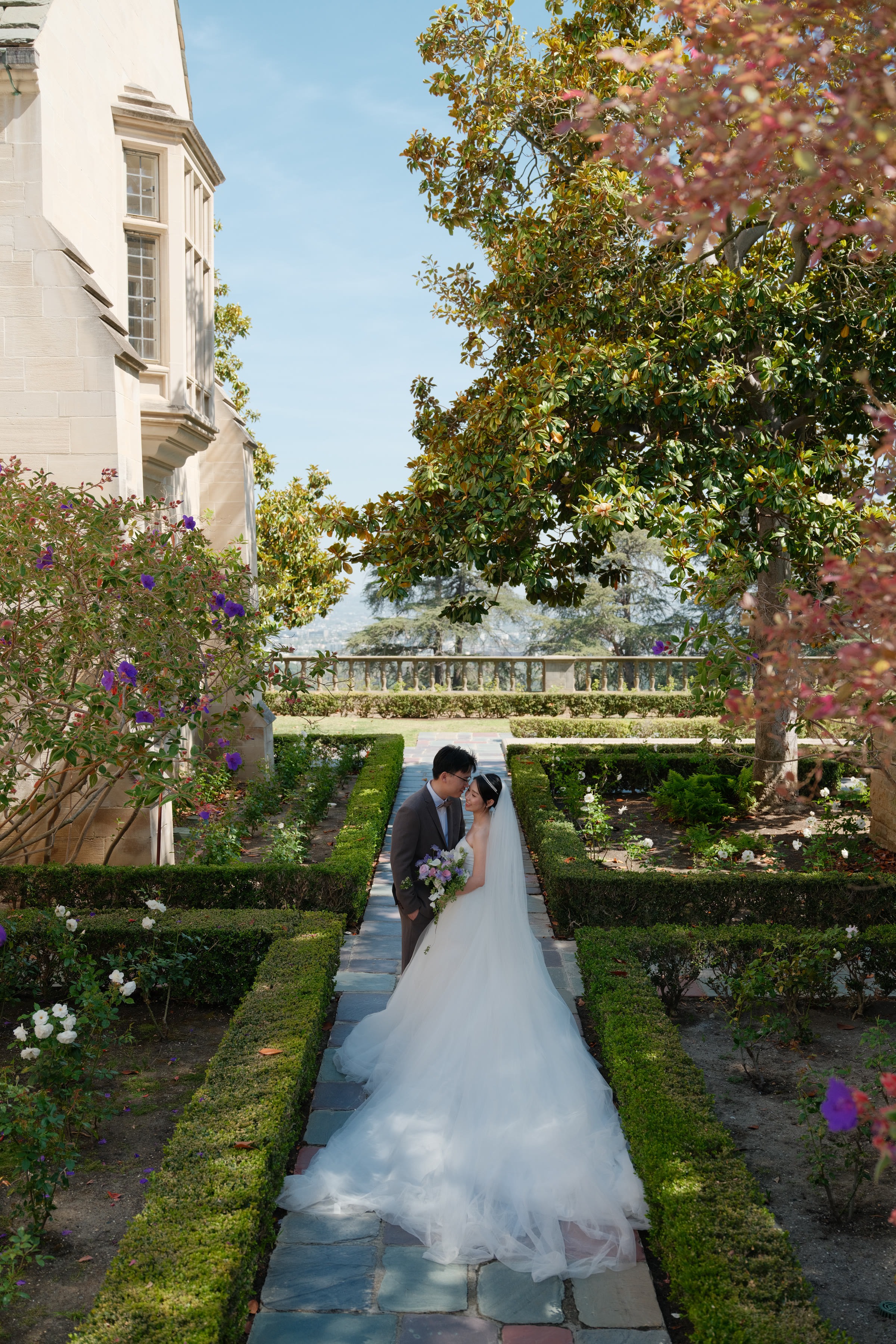 A vertical Greystone portrait of Xinxu and Weiyi